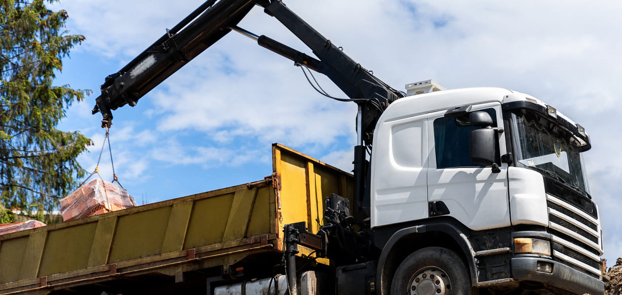 Should I hire a grab lorry or a skip?